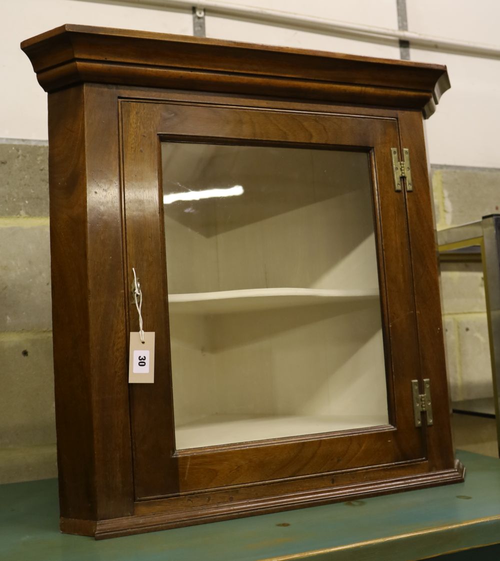 A mahogany hanging corner cabinet, width 68cm, depth 40cm, height 70cm